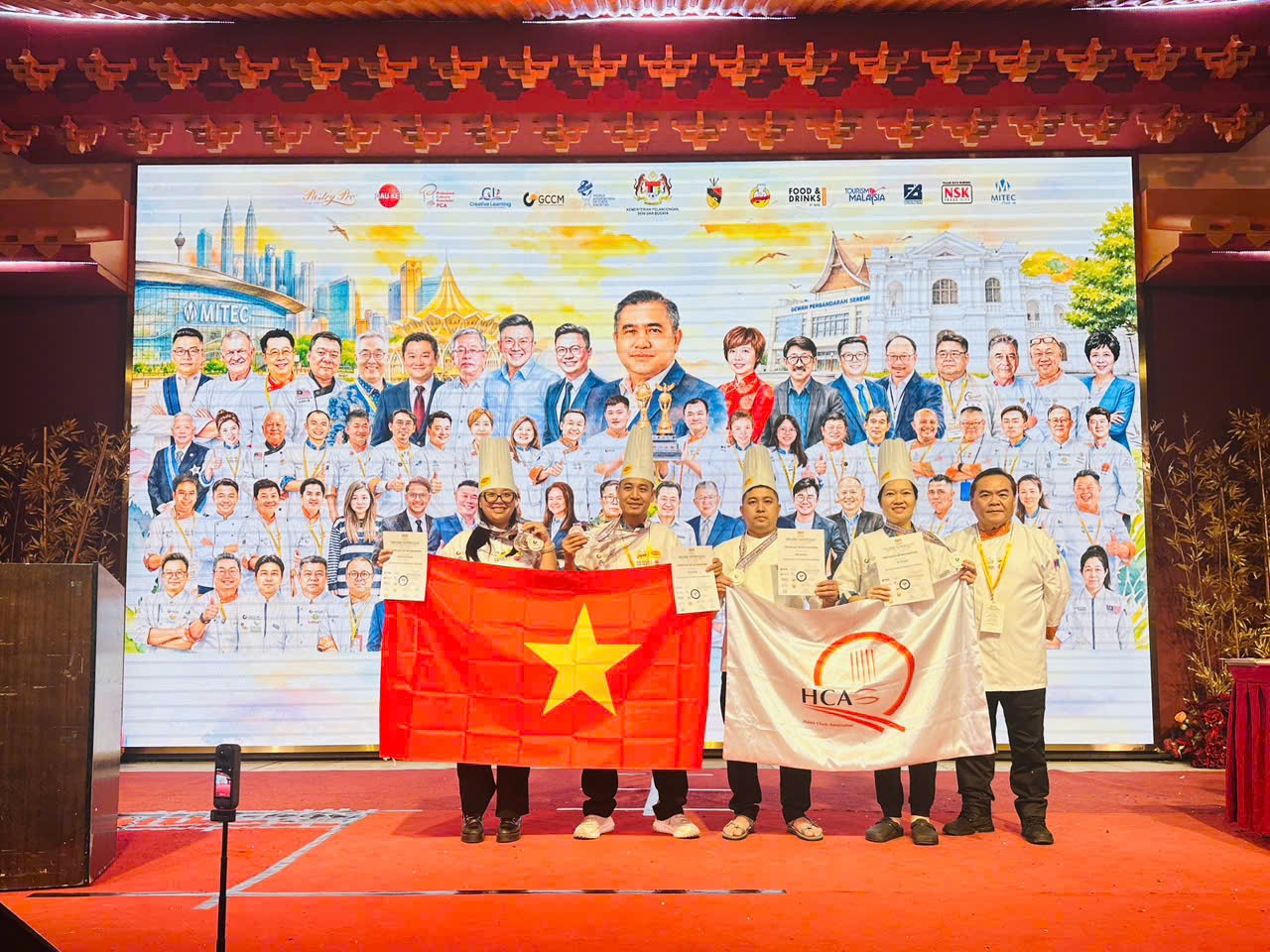 team-a1-voi-4-huy-chuong-bac-va-1-cup-vang-tai-gccm-malaysia-2026-1784980671.jpg